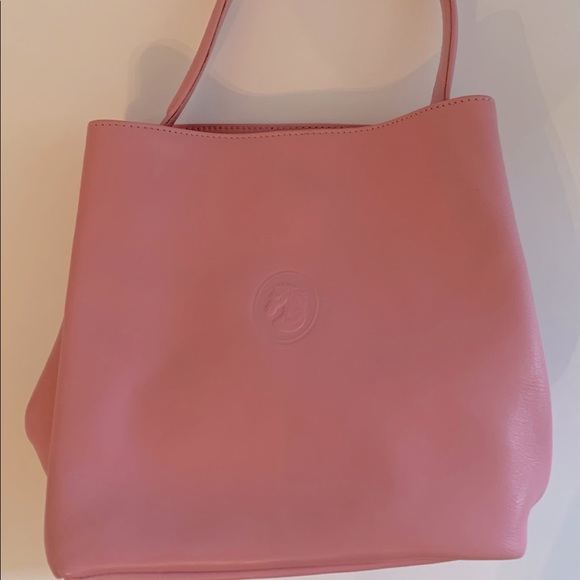 Pink leather handbag with horse emblem from Europe